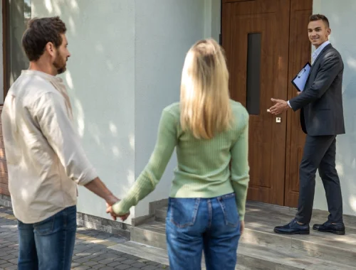 Open home inspection with buyers viewing a residential property